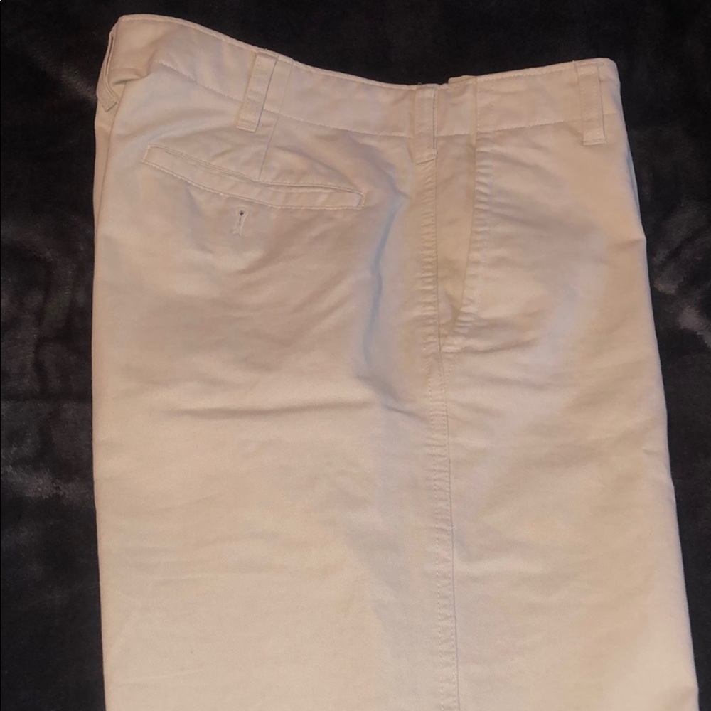 Sand colored khaki dress pants.